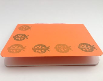 Orange notebook, handmade, stitched spine, handprinted, pomegranate