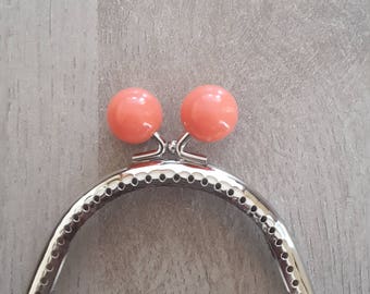 Clasp of purse orange