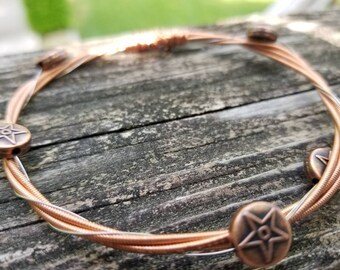 Recycled guitar string bracelet