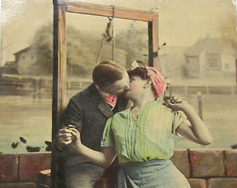 1900s French postcard, Kissing by the well, Antique RPPC real photo, paper ephemera.
