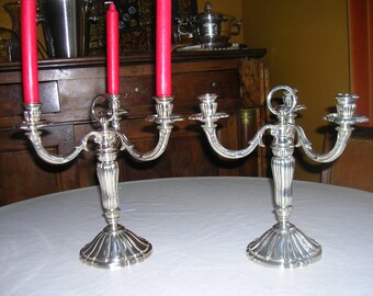 2 candlesticks in silver with three arms