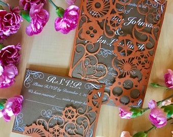 Steampunk laser cut invitation with matching laser cut RSVP card suite gears and hearts with a victorian flare