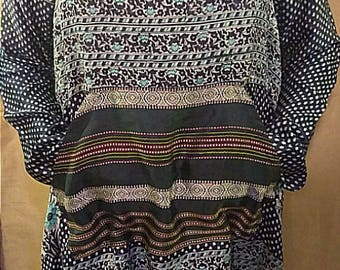 One-of-a-kind 100% up-cycled vintage sari silk unique, multi-patterned tunic with over-sized cowl neck and front pocket detail