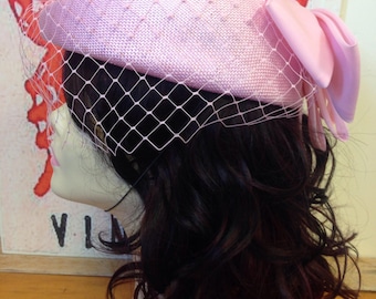 Vintage pink Headways formal hat with veil/ netting and bow detail