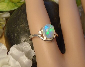 Light Sky Blue Ethiopian Fire Opal 2 Accent Gems Ring, Sterling Silver, Blue & Blue Play 1.45 Cts 9.00 x 7.50 mm Natural Welo Ethiopian Opal