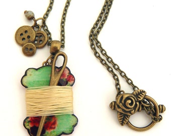 Seamstress pendant, with needle and buttons