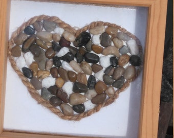 Framed heart with pebbles
