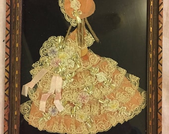 Vintage handmade framed silhouette of a ngirl in lace & ribbon