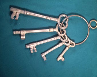 Antique Brass Skeleton keys....Early 1900's...on Brass Key Ring... large solid brass keys with ring