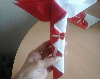 Folding towels red and white palm tree