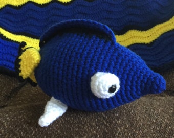 Crocheted afghan and stuffed fish (Dory)