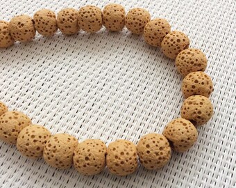 10 round volcanic beads of yellow