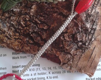 Orifice Hook ~ Silver wire weave with red glass bead
