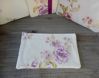 Clutch soft ivory and purple flowers