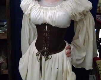 Genuine Leather and Steel Wench Belt = Fashionable support, durable beauty.