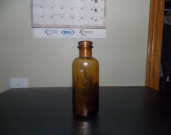 small antique medicine bottle