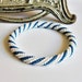 Blue and White ornament Bracelet - White and Blue Spiral Nepal Roll On Bracelet - Crochet Rope Bracelet - Crocheted seed bead Bracelet