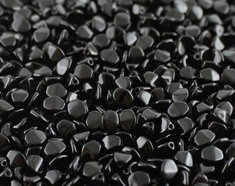 150 St. opaque black pinch bead 5x3mm