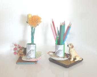 Jars with pencils, vase, bird, centerpiece table decoration