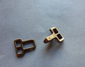 Ties / clips for pants or skirt in metal BRONZE