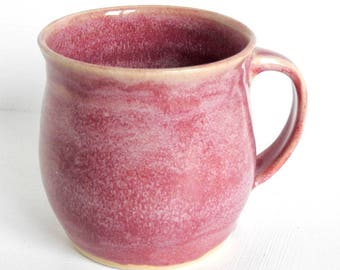 Handmade stoneware mug in warm misty pink
