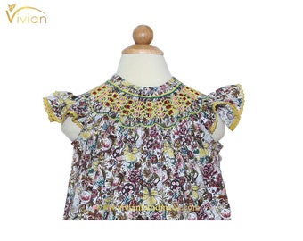 D17.39 - Hand smocked bishop dress