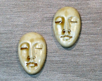 Pair of Two Medium Almond Ceramic Face Stone Cabochons in Peachy Tan