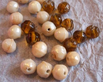 Assorted amber and cream plastic beads