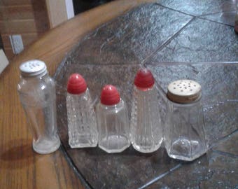 5 odd vintage salt and pepper shakers