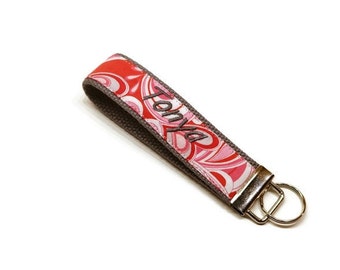 Beautiful pink and red key fob wristlet keychain. Personalization available.