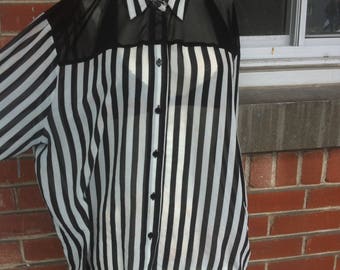 Large blouse can fit medium
