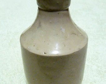 An Antique Stoneware Ink Bottle