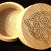 Engraved small round box, Triquetra