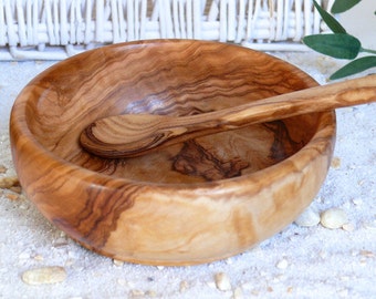 Baby food spoon and bowl of olive wood