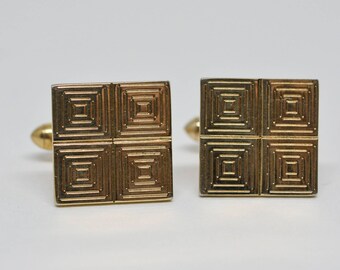 Gold tone cuff links