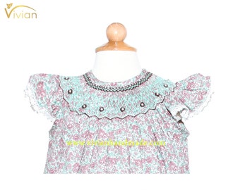D17.55 - Hand smocked bishop dress
