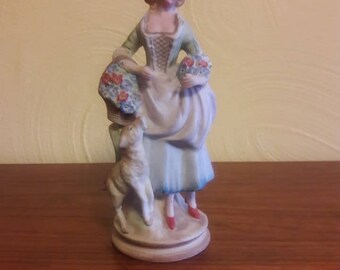 Elegant Bisque Colonial Lady with Hat, Dog, and 2 Flower baskets - Made in Occupied Japan