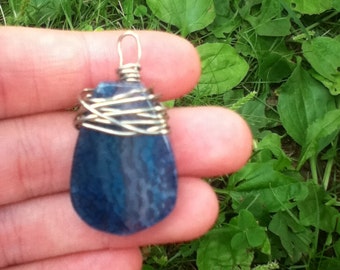 Free shipping. Blue wire wrapped pendant