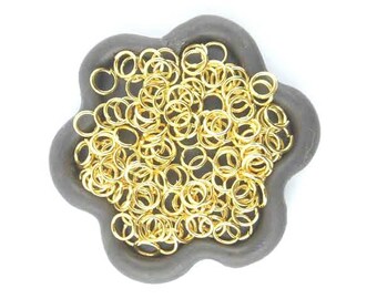 x 100 5mm (02E) Gold open jump ring