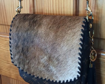 Cowhide and leather purse / tote