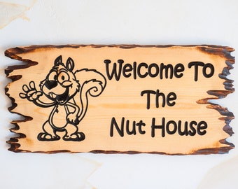 Welcome to the Nut House sign