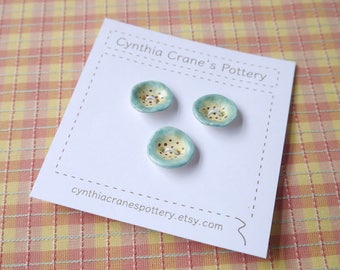 Small Blue Hollyhock Buttons, Ceramic Porcelain Clay, Blue and Yellow with Brown Highlights