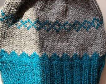 Open-ended, hand-knitted beanie