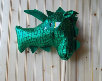 Green Dragon stick horse ride on hobby horse toy for kids.