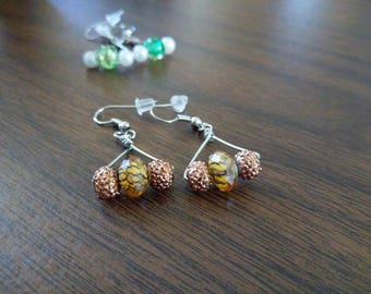 Glittering tiger triangular earrings