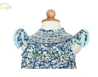 D17.40 - Hand smocked bishop dress