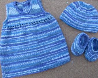 Newborn baby dress, shoes and hat hand-knitted in soft acrylic yarn.