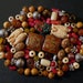 Beads and pendant from Nepal in agate, yak bone, coral, Tiger eye, sandal wood and metal