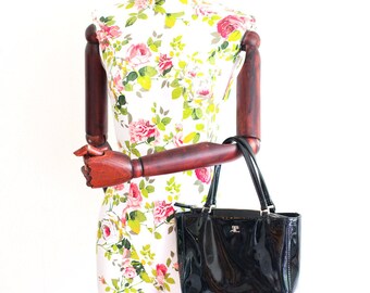 Courrege black patent leather handbag
