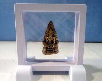 Miniature metal horse figurine in a 'magic' frame